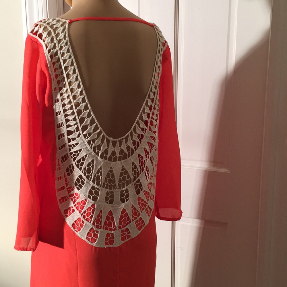 Orange dress with stunning cutout back!